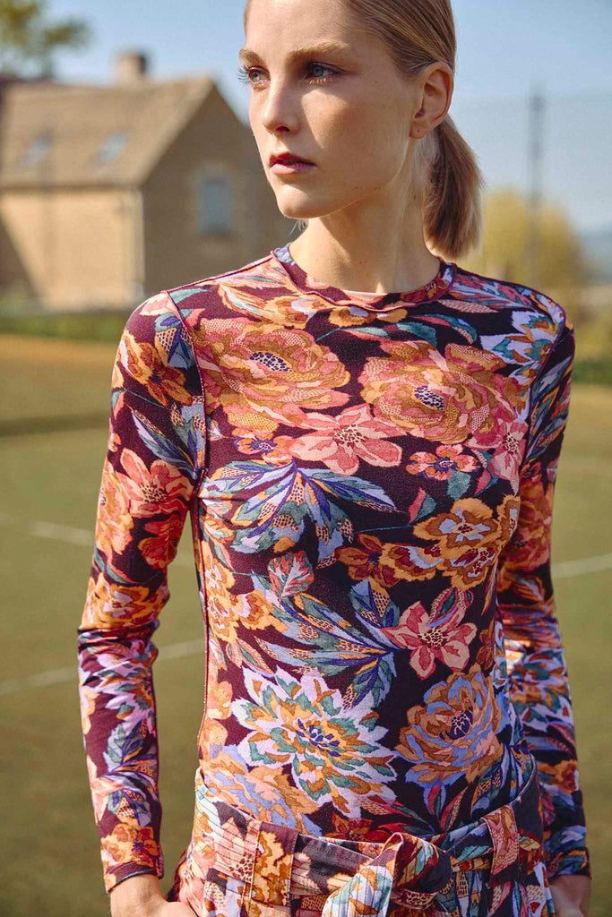 The Margaret floral top has a fitted silhouette and a classic crew neckline.