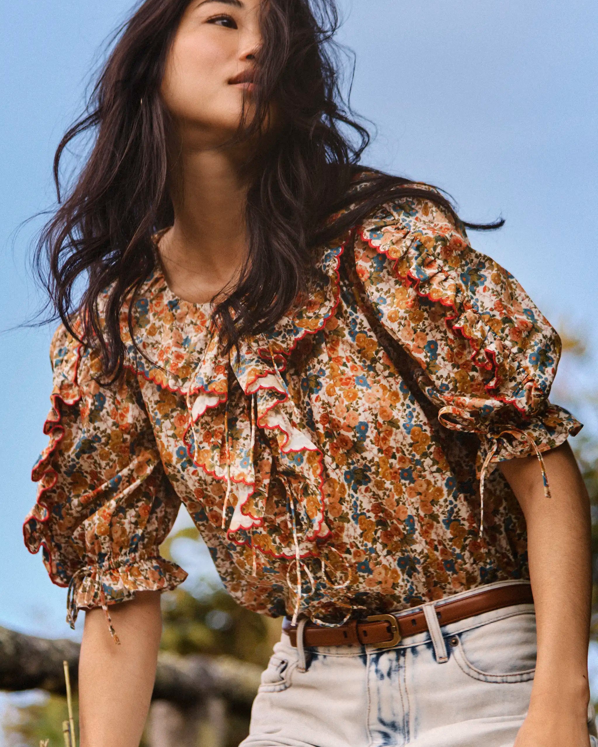 The Marigold Top in Gertrude paired with the Wray Pant in washed blue denim. 