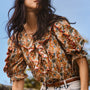 The Marigold Top in Gertrude paired with the Wray Pant in washed blue denim. 