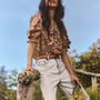 The Marigold Top in Gertrude paired with the Wray Pant in washed blue denim. 