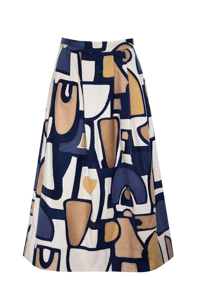 The Market tapestry skirt has a banded waist, side pockets, and elegant pleats.