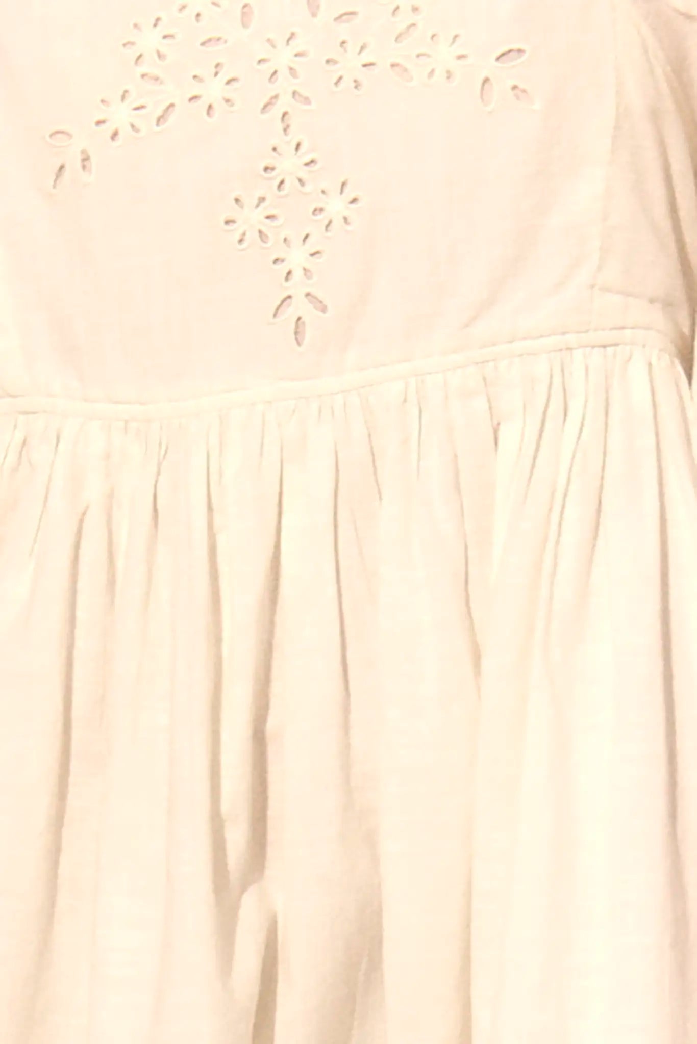 Close up of the Maya Dress in white.
