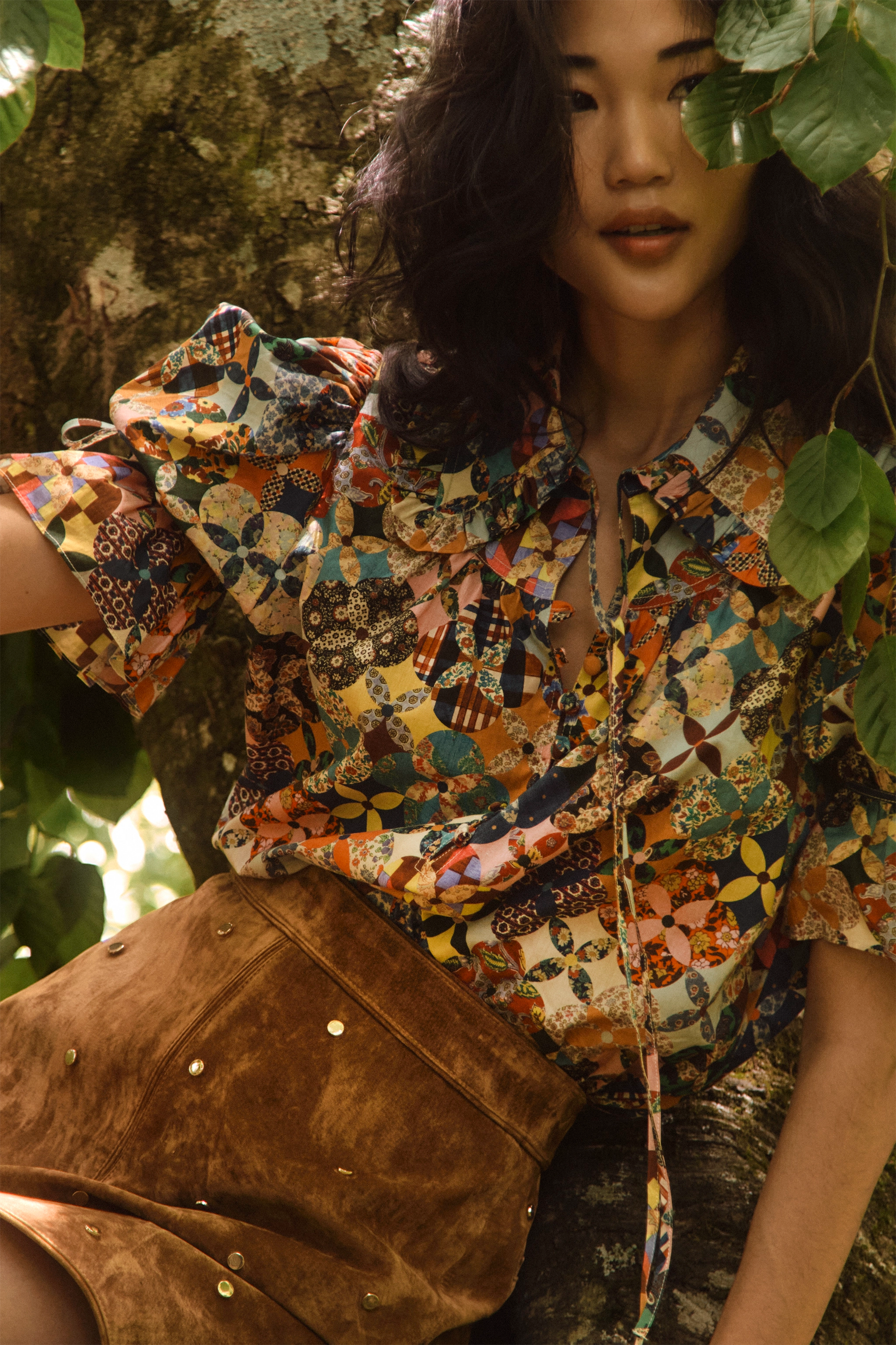 The Mayfair Blouse in Picnic Quilt paired with the Dottie Mini Skirt in Saddle. 