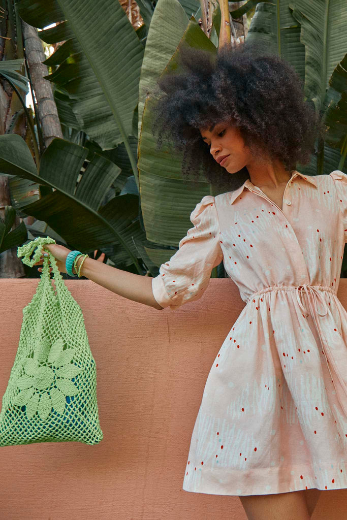 Neon tote bag, hand crocheted in Bolivia by local artisans.
