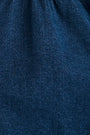 Close up of the Mika Top in Blue Ridge Denim. 