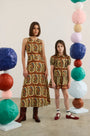 Faith Dress and Kids Drifter Mini Dress in Amber Glen cream.