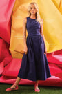 A sleeveless midi navy dress with a fitted bustier bodice, crew neckline, and a bustled full skirt.