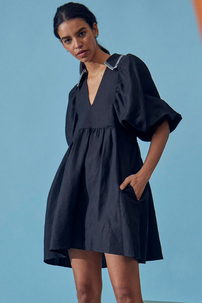 The Noah shift dress with a contrast whipstitch collared v-neckline and hidden hip pockets.