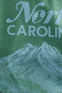 Close up of the North Carolina Tee in Pine Grove