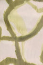 Close up of the Britt Mini Skirt in Seabreeze Ikat Green. 