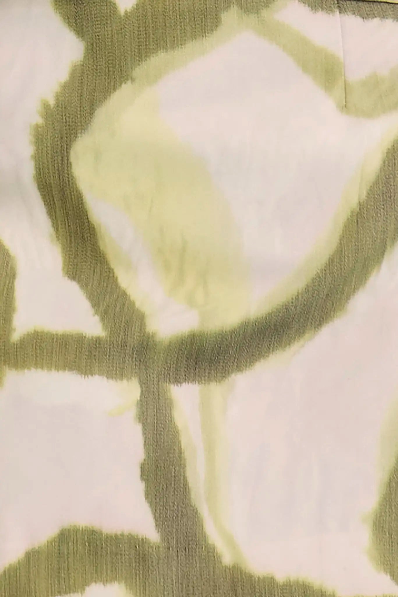 Close up of the Britt Mini Skirt in Seabreeze Ikat Green. 