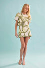 The Olivia Top in Seabreeze Ikat Green with matching Britt Mini Skirt.