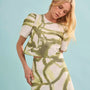 The Olivia Top in Seabreeze Ikat Green with matching Britt Mini Skirt.
