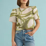 The Olivia Top in Seabreeze Ikat Green with denim.