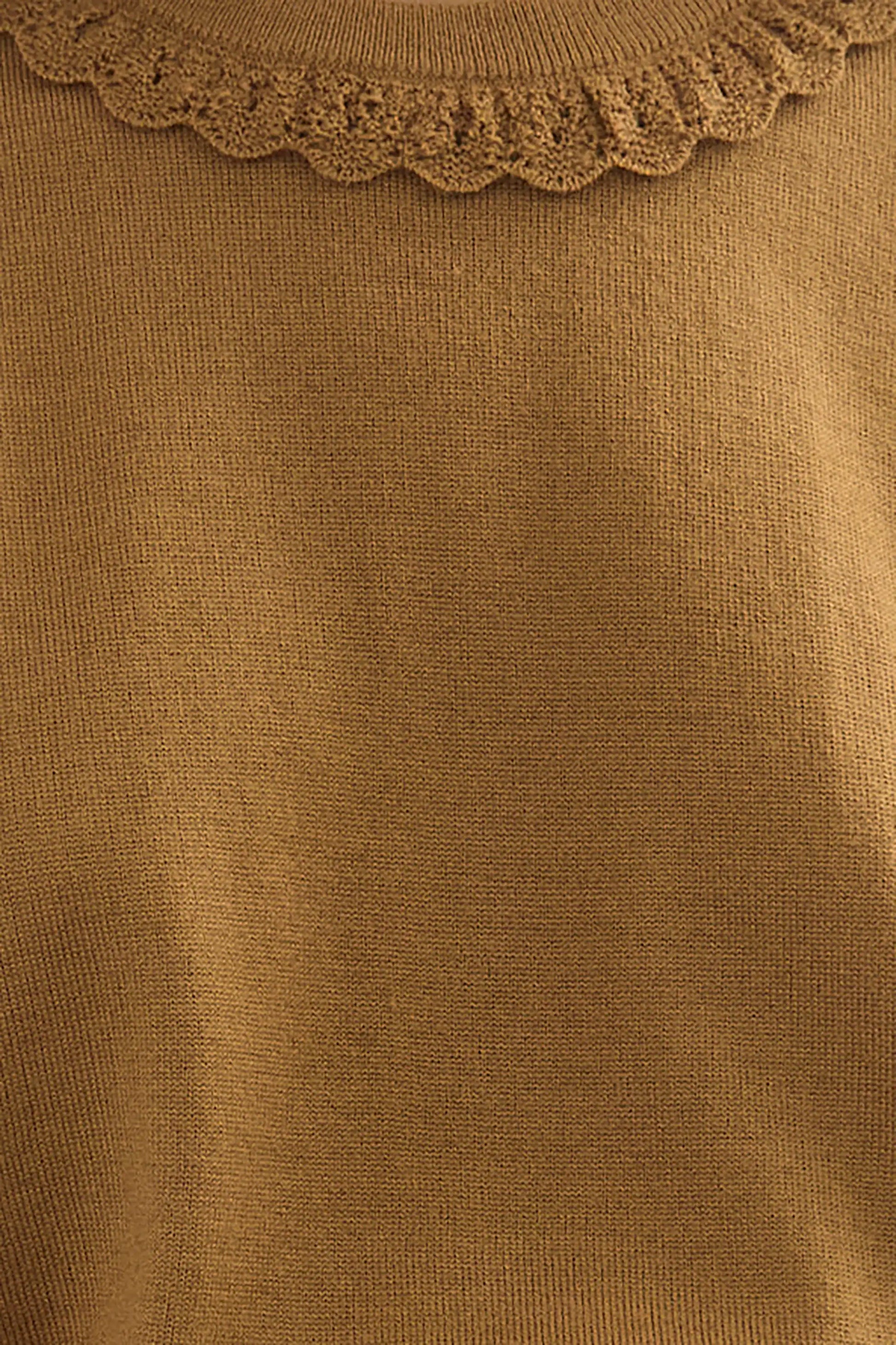 Close up of the opal sweater in Chestnut.
