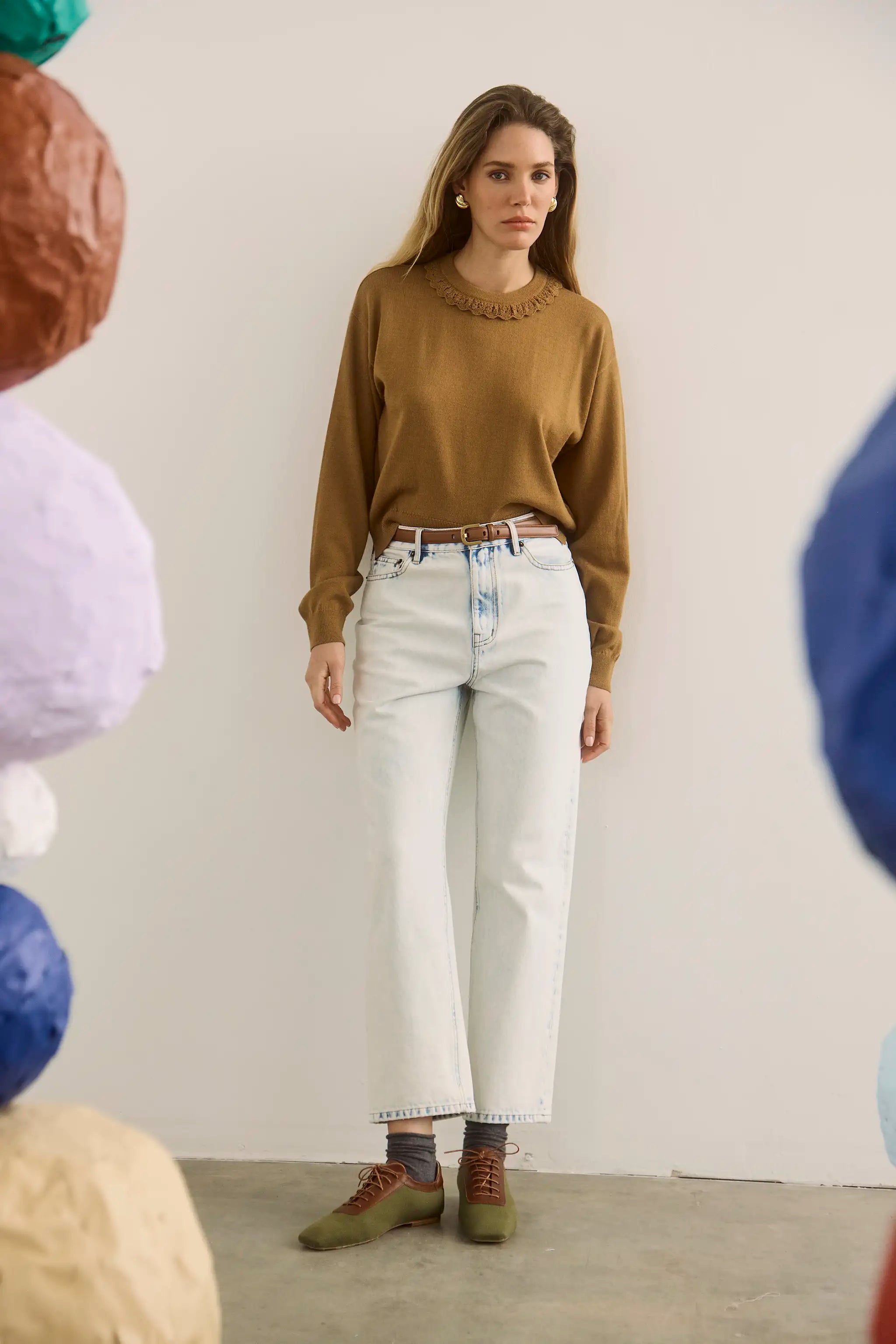 The Opal Sweater in Chestnut paired with the Wray Pant in washed blue denim. 