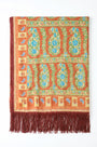 The scarf in Amber Glen Brown. 