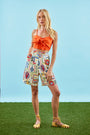 The Ginny Bermuda Shorts in Coastal Conversation paired with Pearl Top in Tangerine Tango