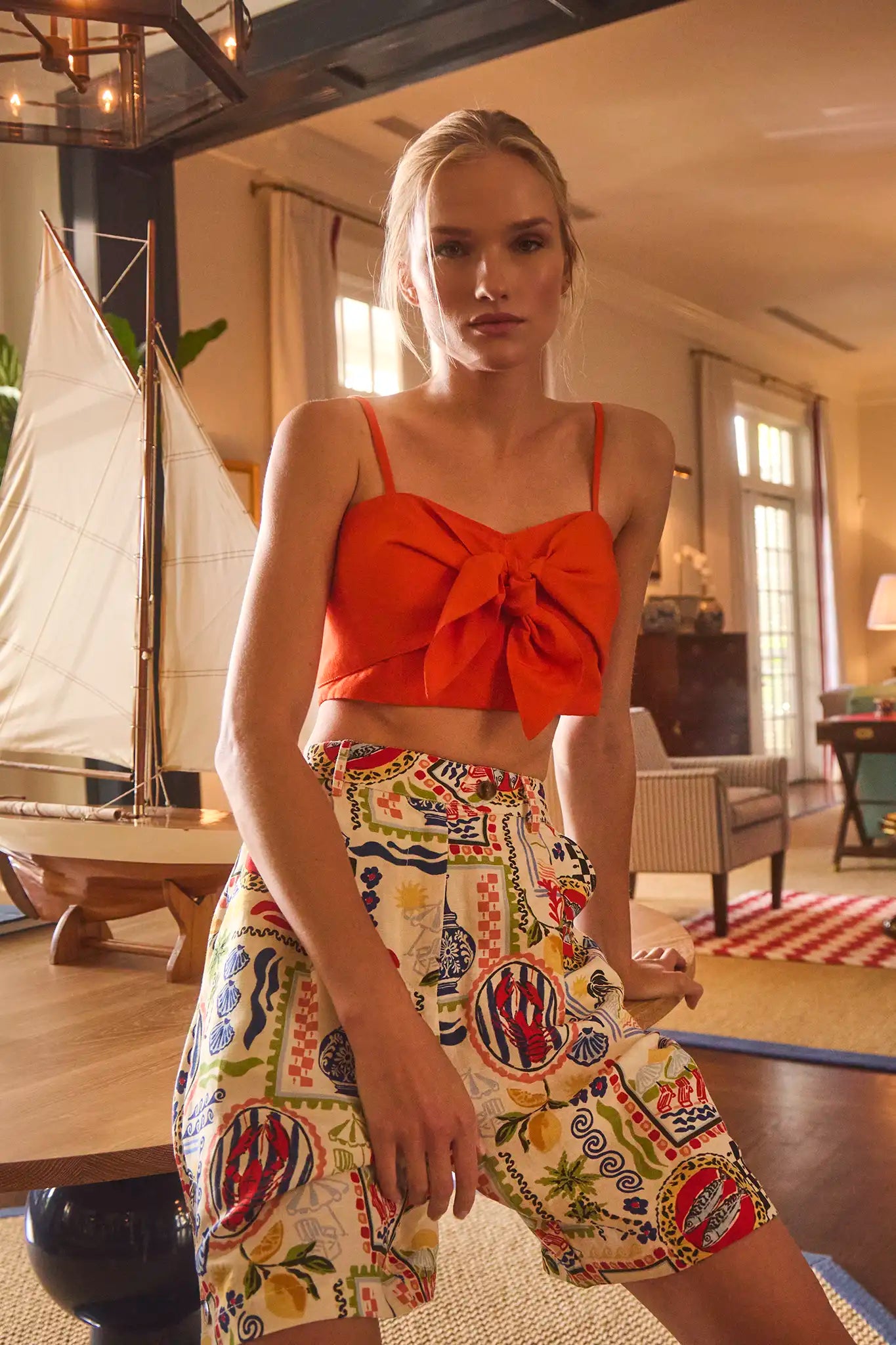 The Ginny Bermuda Shorts in Coastal Conversation paired with Pearl Top in Tangerine Tango