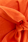 Close up of The Pearl Top in Tangerine Tango 