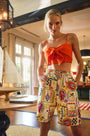 The Ginny Bermuda Shorts in Coastal Conversation paired with Pearl Top in Tangerine Tango