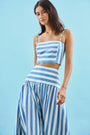 The Alyssa Midi Skirt paired with matching pepper top in blue and white stripe on model.