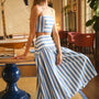 The Alyssa Midi Skirt paired with matching pepper top in blue and white stripe on model.