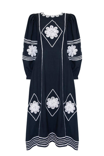 The Pimms embroidered midi dress has a crew neckline and long blouson sleeves with button cuffs.