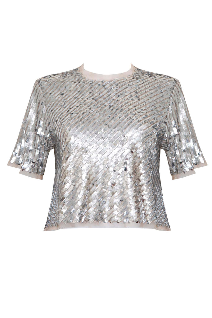 The Pixie sequin top has chiffon trim at the neck, sleeves, and hem.