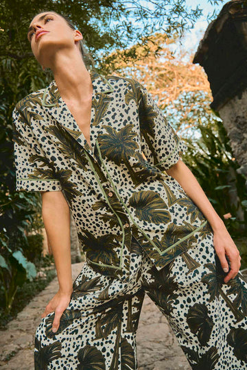 The Polly Shirt is a collared neckline short-sleeved novelty camp shirt in our midnight palm print.