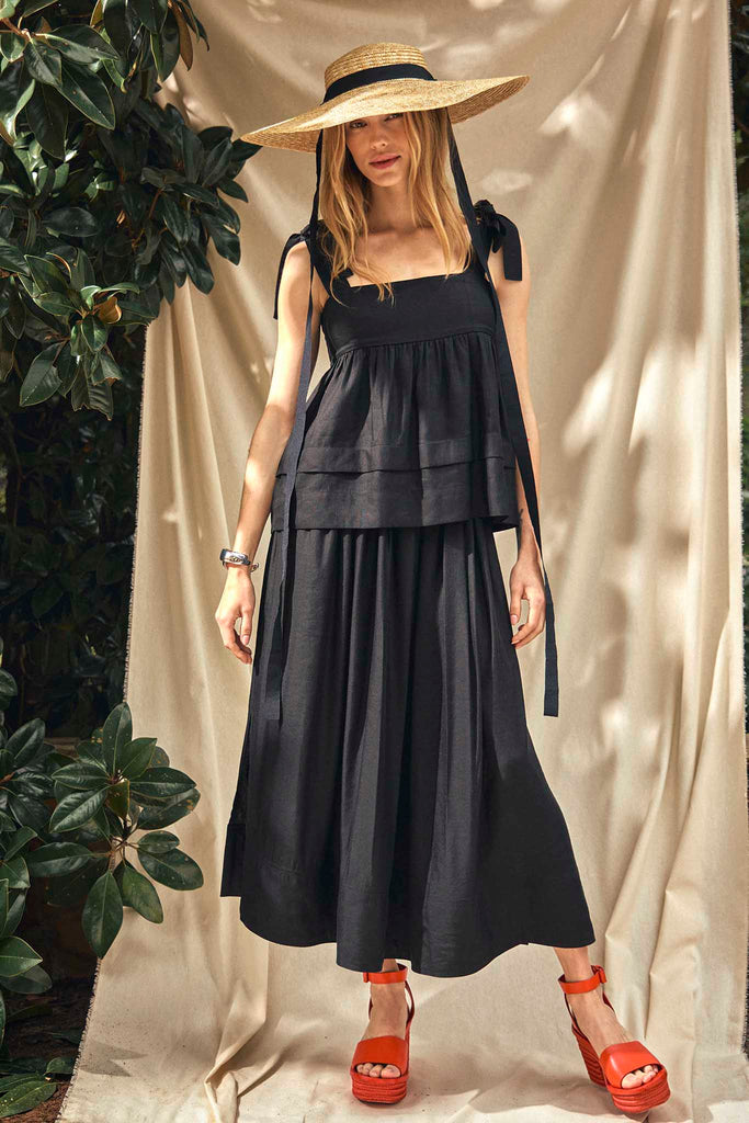 The Pruett top has self tie straps and an empire waist with tiered panels for a flowy silhouette.