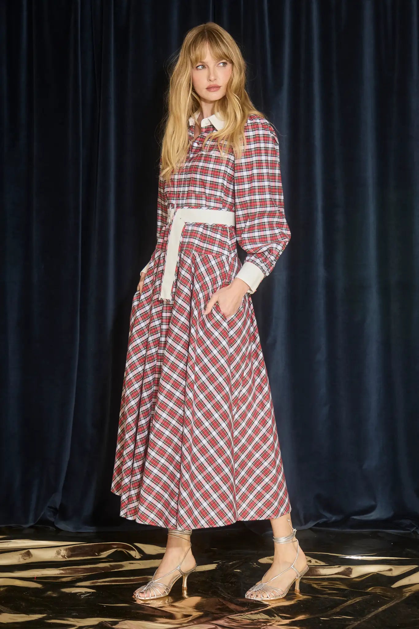 The Randolph Dress has a circle skirt, full length sleeves with button cuffs and optional belt.