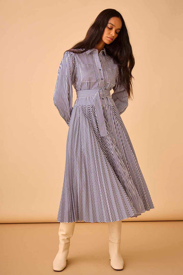 The Randolph striped shirtdress has a pleated skirt and an optional belt.