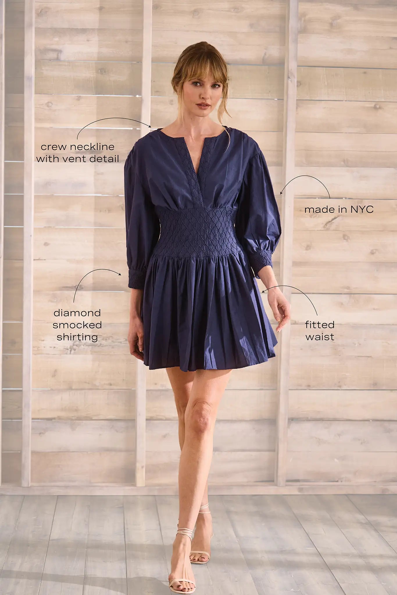 Navy diamond-smocked novelty shirting fabric with a soft V effect and blouson sleeves.