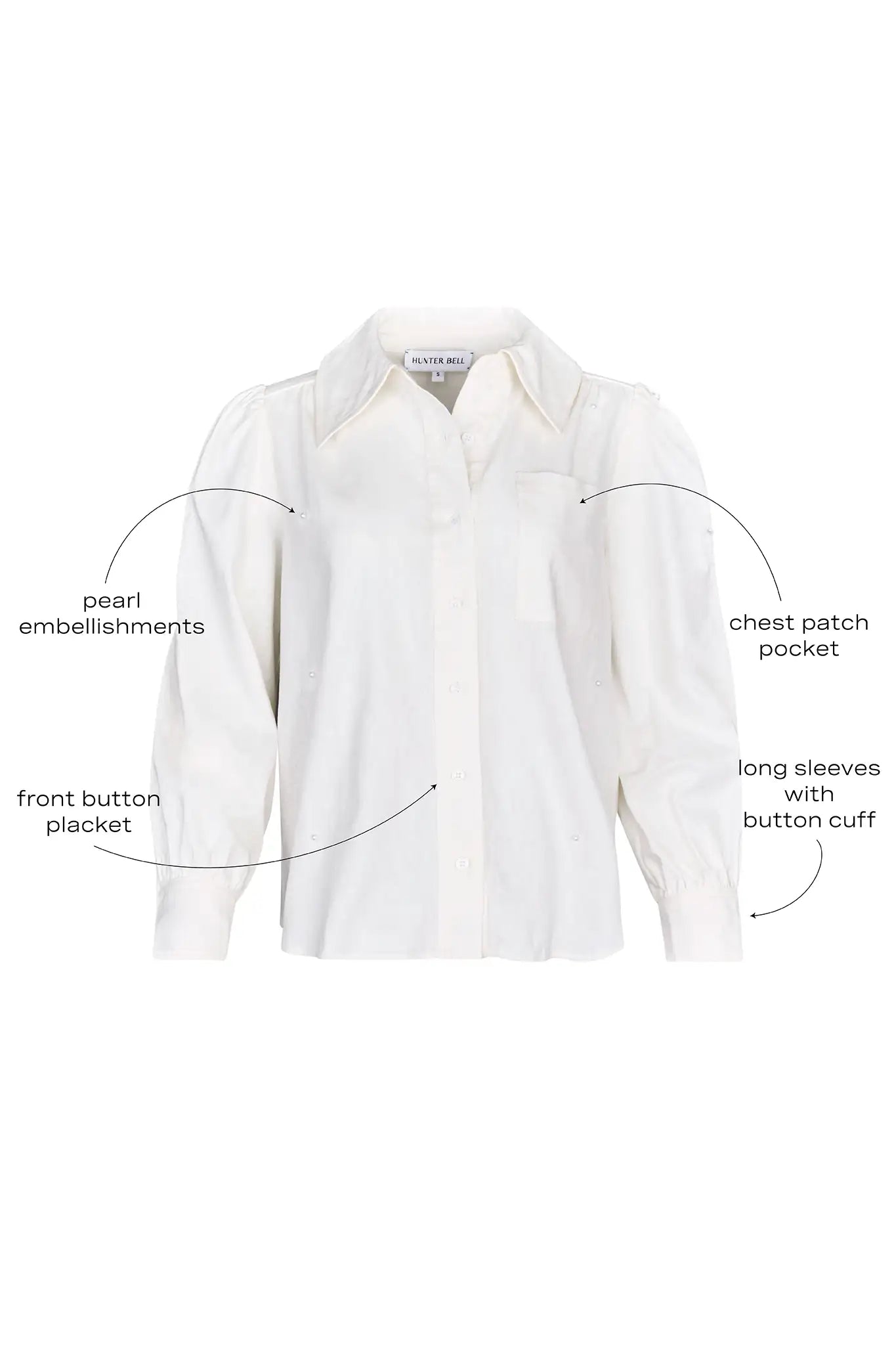 White linen long-sleeve collared shirt with roll-tab sleeves and pearl embellishments.