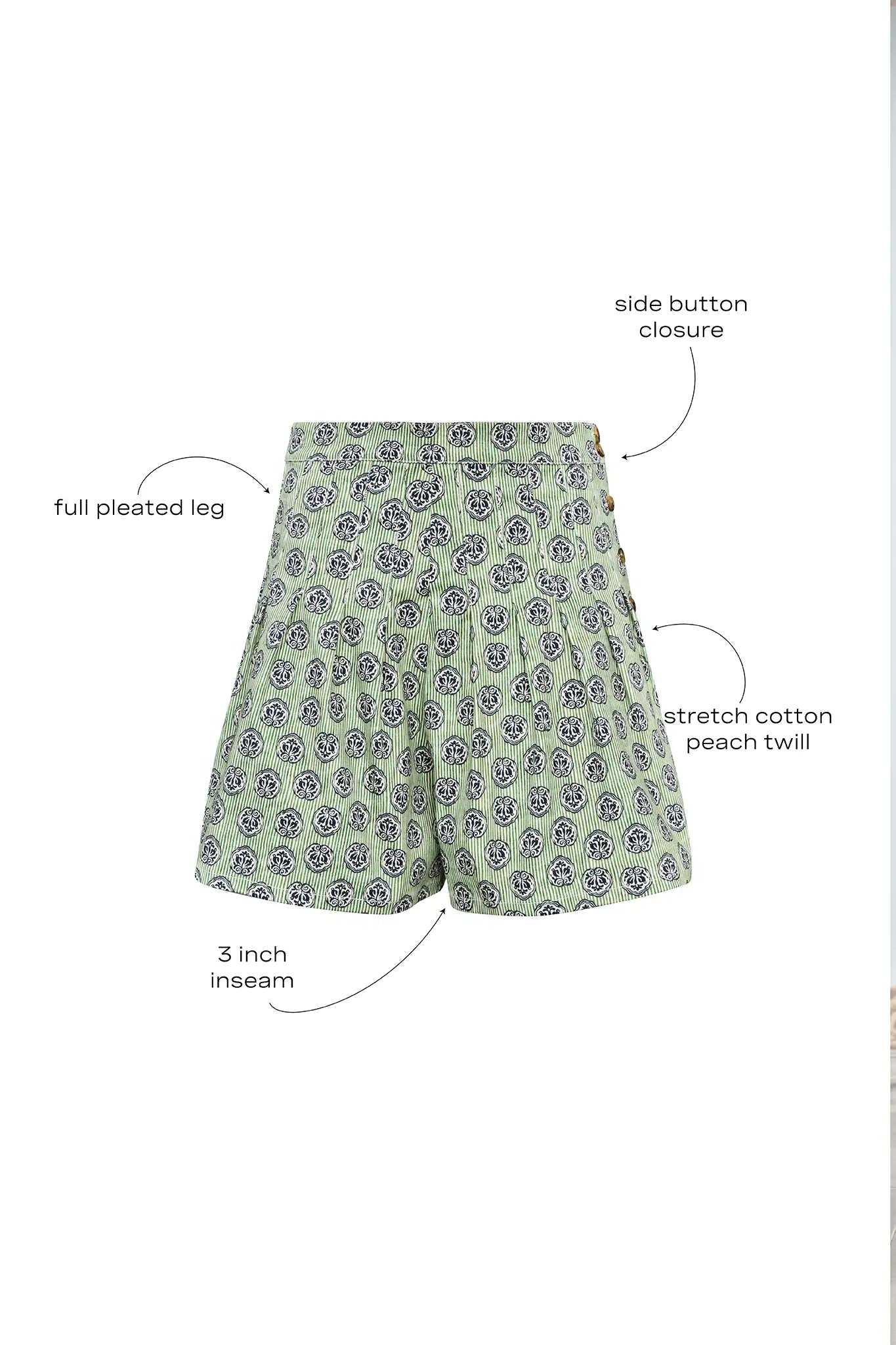 Stretch sateen pleated shorts with a banded waist in Navy Bird Block print.