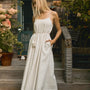 Ivory cotton-linen pearl embellished maxi dress with slim spaghetti straps and optional tie waist.