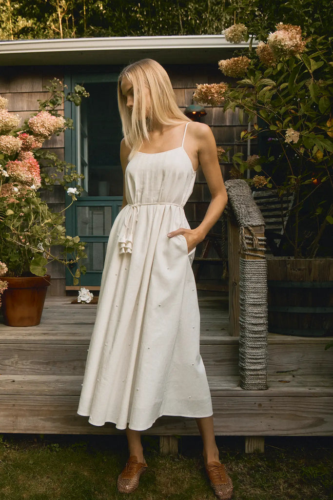 Ivory cotton-linen pearl embellished maxi dress with slim spaghetti straps and optional tie waist.