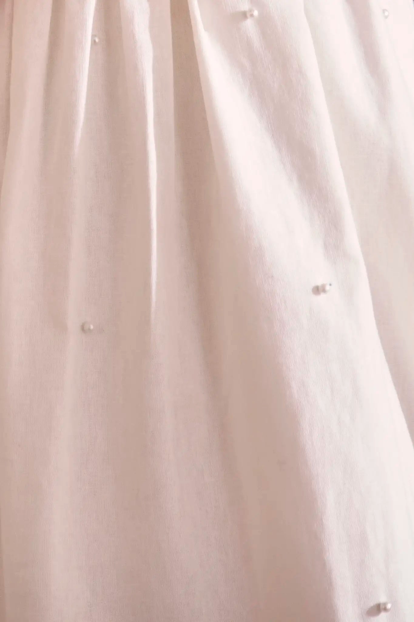 Ivory cotton-linen pearl embellished maxi dress with slim spaghetti straps and optional tie waist.