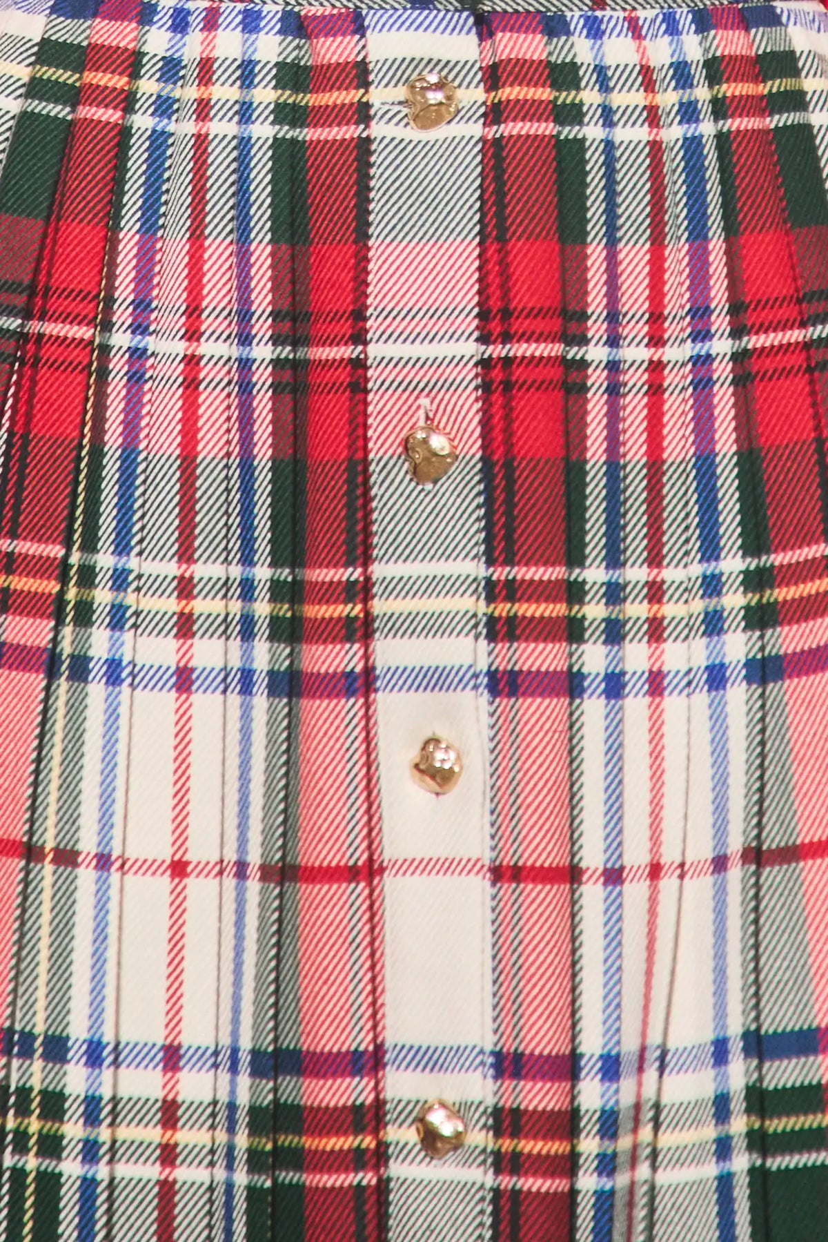 Close up of the Harlan Skirt in Kensington Plaid Crimson. 
