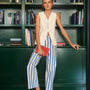 The Juno Pant in Sailing Stripe paired with Roma Vest on model 