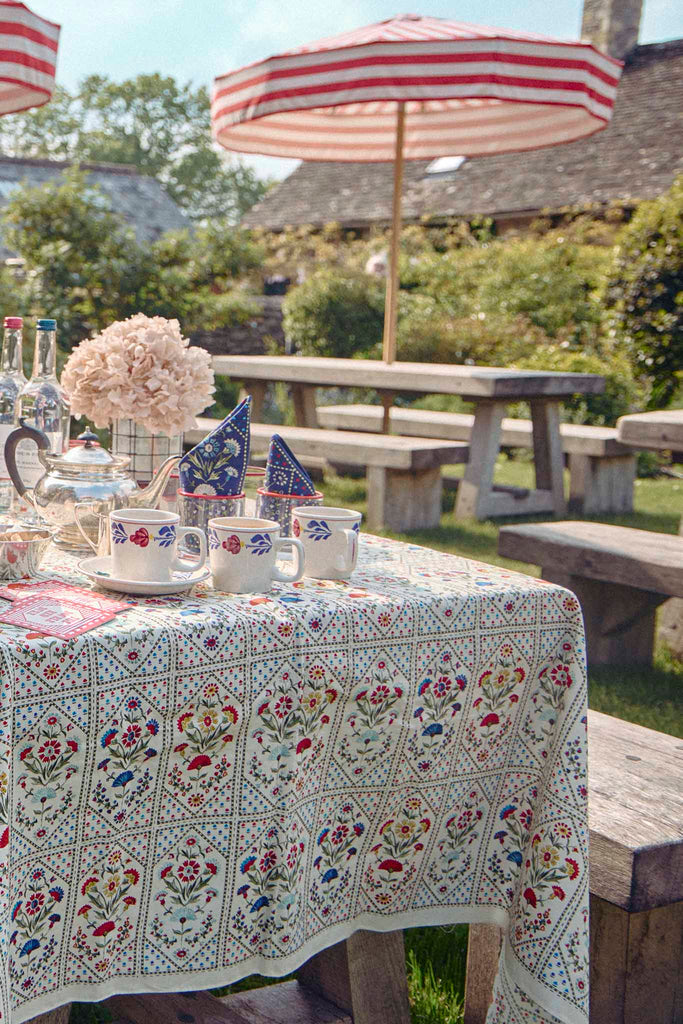 Elevate your dining experience with Hunter Bell's exquisite Cream Trellis patterned tablecloth.