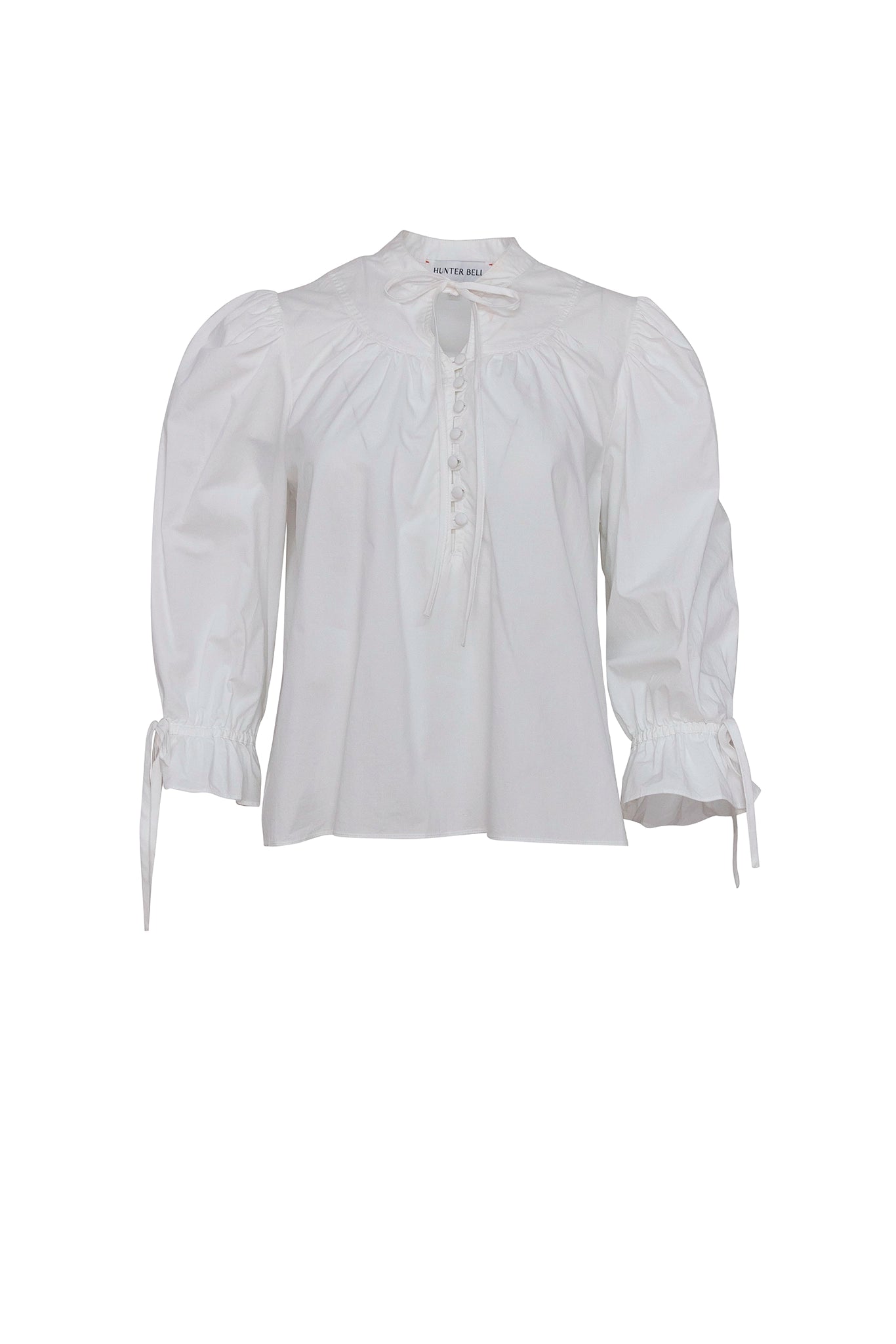 The Rory Top has a V-neck, a tie keyhole, a gathered yoke and a partial button-front placket.