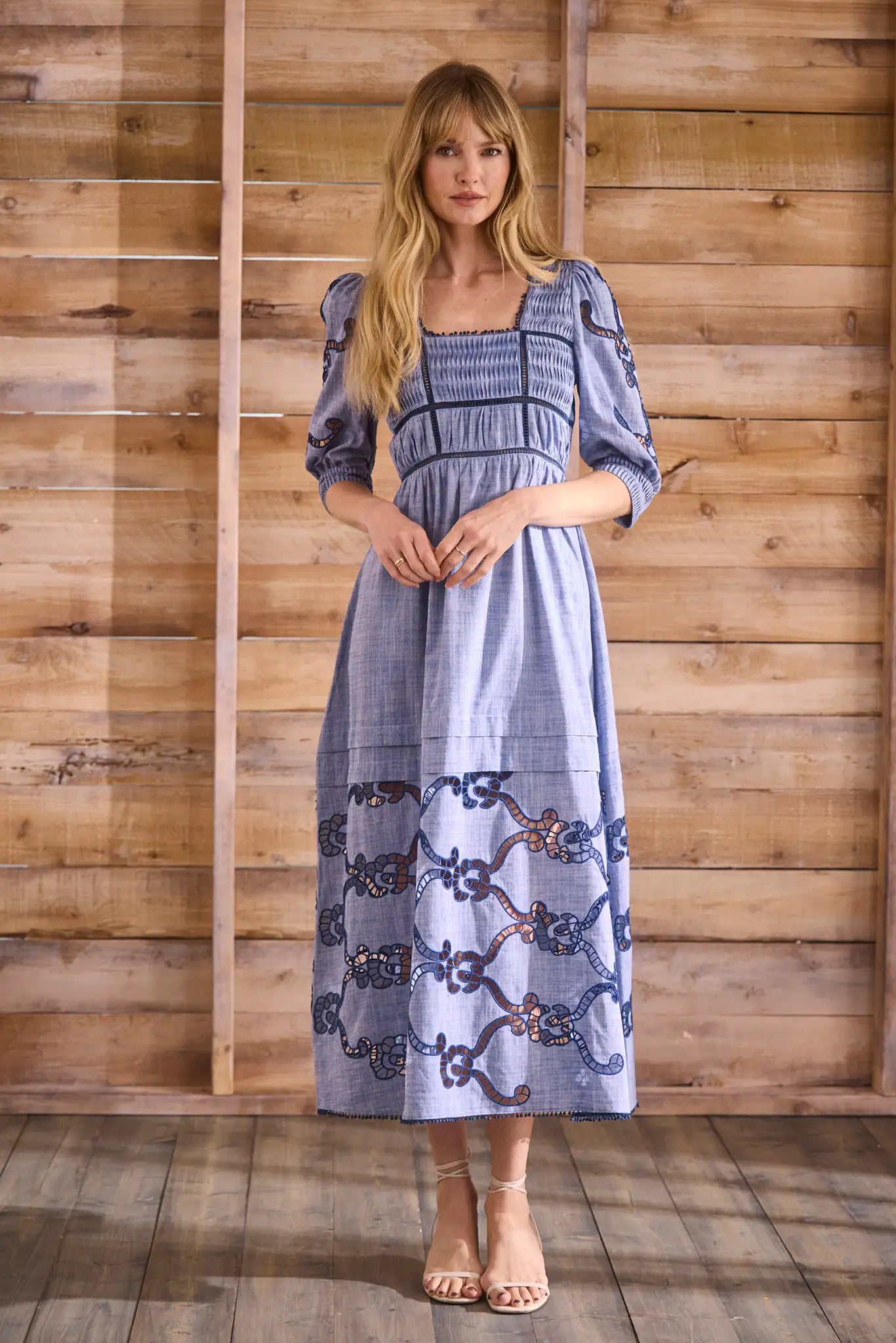 Embroidered Midi Dress with a square neckline, crochet lace tracing the bodice, skirt, and sleeves.
