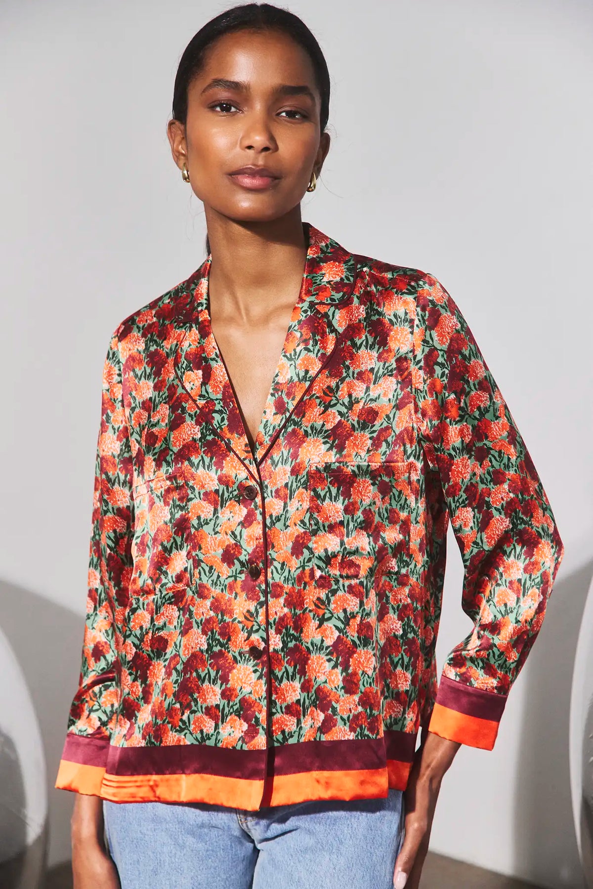 The Roxy Top in Crimson Blossom paired with denim. 