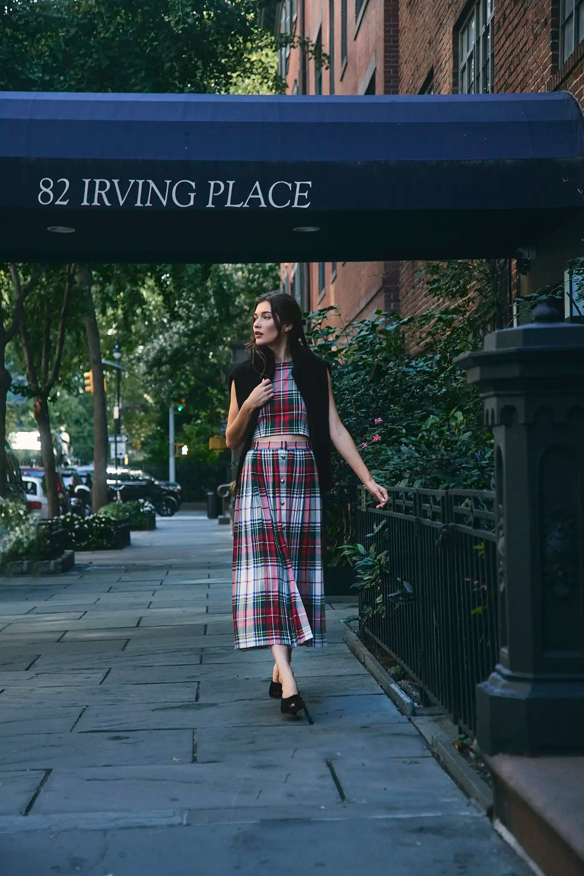 The Royce Top in Kensington Plaid Crimson paired with the Harlan Skirt. 