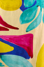 A midi pencil silhouette in our Stroke of Spring print. With a clean back vent and zipper closure.