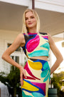 A midi pencil silhouette in our Stroke of Spring print. With a clean back vent and zipper closure.