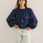 The Rue Blouse in Atelier Splatter Navy paired with the Wray Pant. 