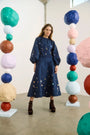 The Ida Skirt in Atelier Splatter Navy paired with the matching Rue Top. 